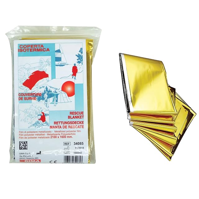 Manta térmica GIMA con una cara plateada y una cara dorada, plegada en su funda