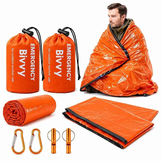 Funda de vivac de emergencia HappyDaily de Mylar naranja con su bolsita de cordón, silbato y mosquetón