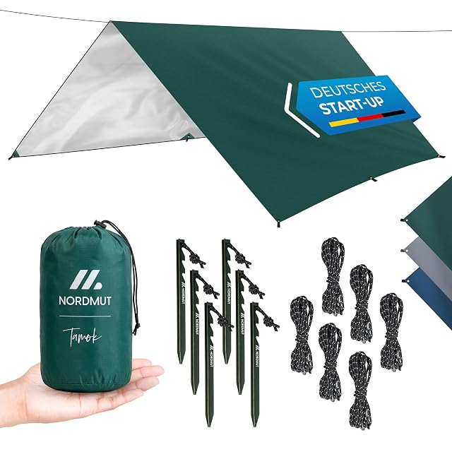Toldo de camping verde NORDMUT montado como refugio de lluvia
